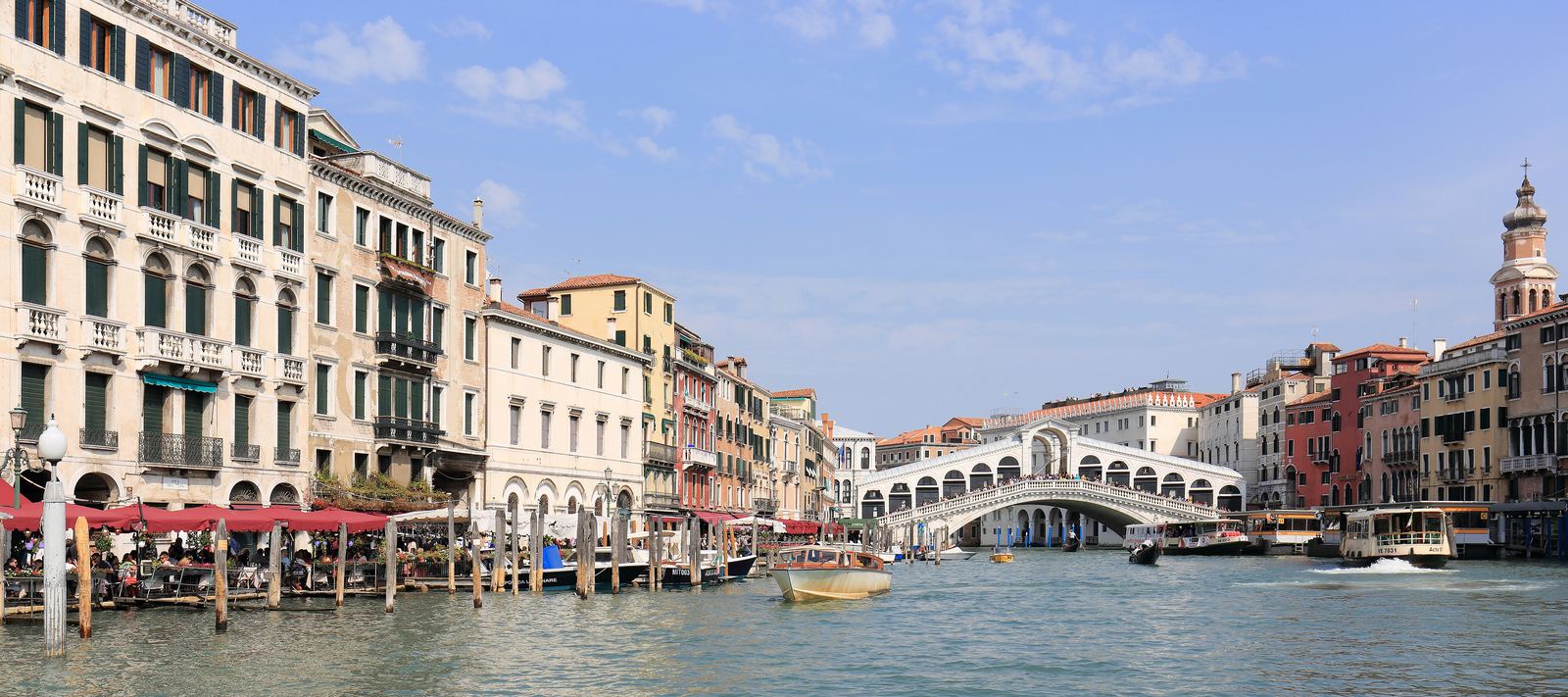 Panorama of the Grand Canal in Venice with the Rialto Bridge and palaces along the water